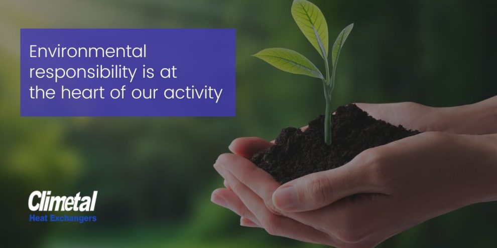 Hands holding soil with a young green plant — Climetal promoting sustainable HVAC and environmental responsibility.